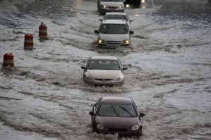 Cars were floating away down streets. BUT THOSE STUPID ORANGE CONSTRUCTION CONES DIDN'T EVEN BUDGE. WHAAAA....????